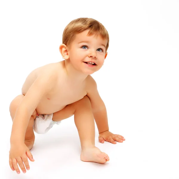 Szczęśliwy chłopca w pieluchy na białym tle — Zdjęcie stockowe