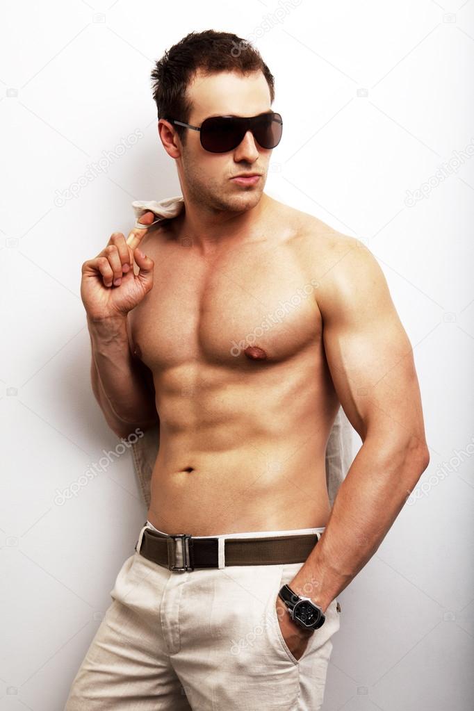 Man with sexy body posing fashion