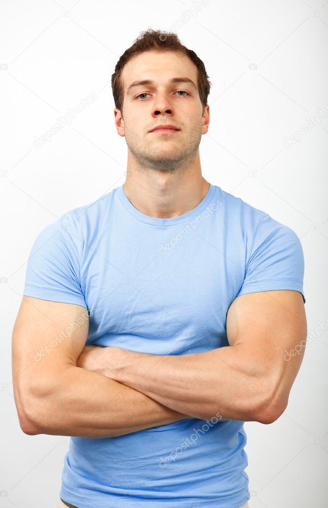 Bully or arrogance concept - muscular guy looking tough