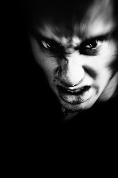 Evil face of scary man Stock Image