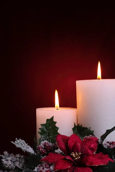 Burning candles with seasonal decorations — Stock Photo, Image