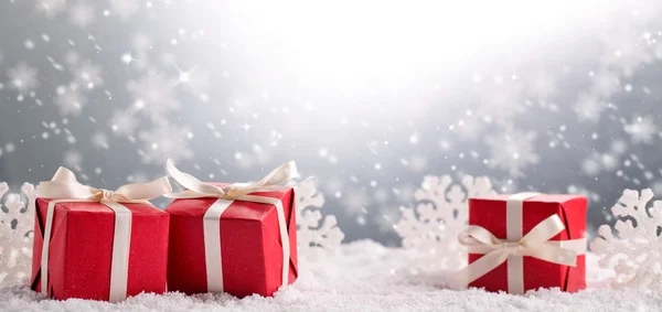 Christmas gift box on snow — Stock Photo, Image