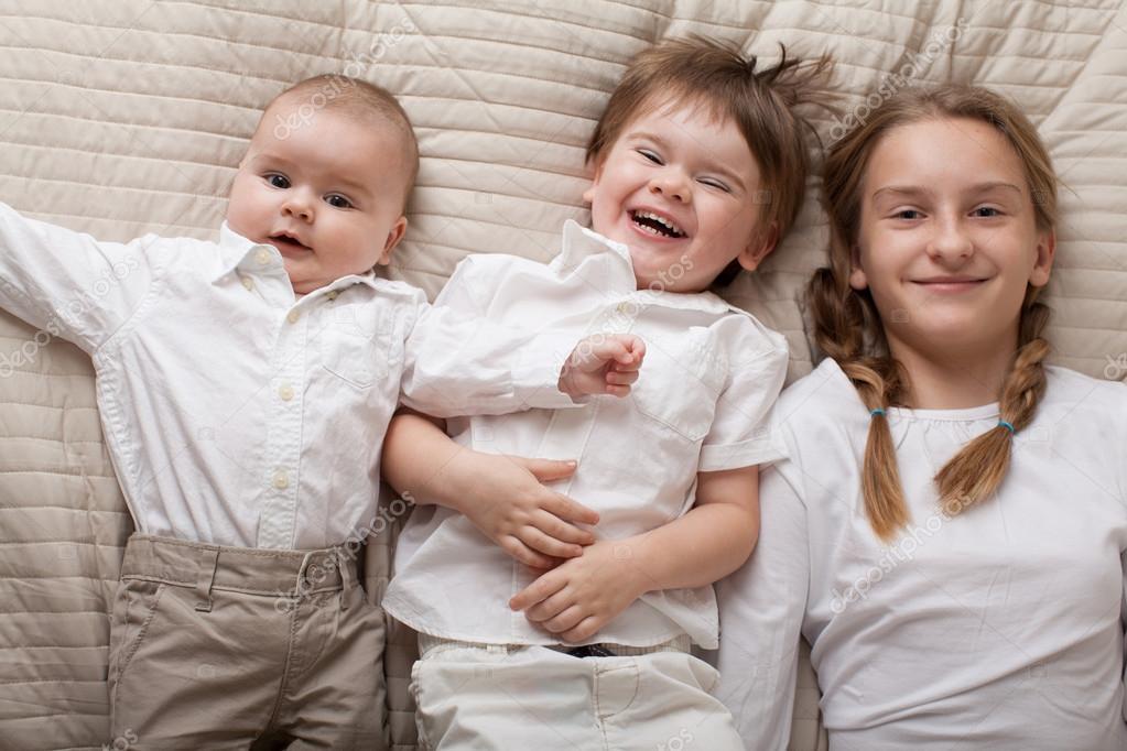 Cute happy siblings expressing happiness. — Stock Photo © Mirmoor #88970558