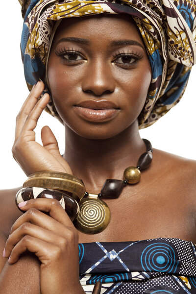 Young beautiful African fashion model in traditional dress.