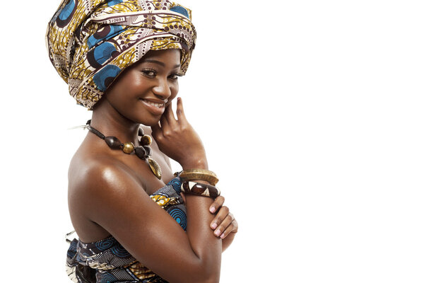 Young beautiful African fashion model in traditional dress.