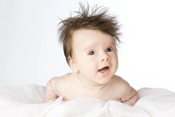 Bonito menino com cabelo comprido . — Fotografia de Stock