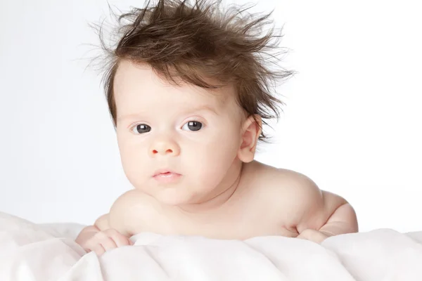 Lindo bebé con el pelo largo . —  Fotos de Stock