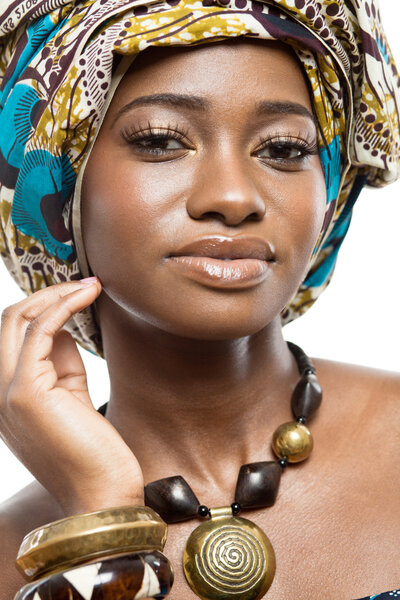 Young beautiful african fashion model on white background.