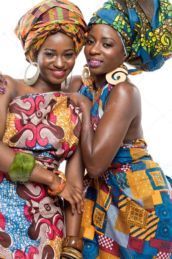 Two African fashion models on white background.
