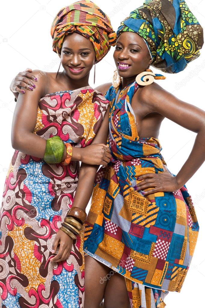 Two African fashion models on white background.
