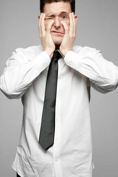 Businessman in white shirt expressing problems. — Stock Photo, Image