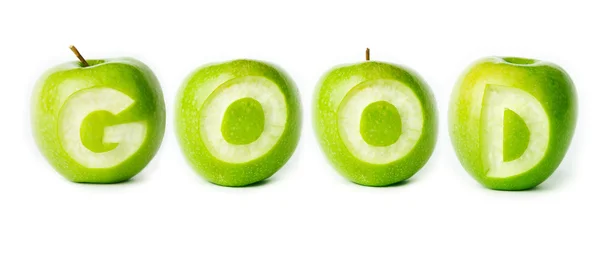 "Jó" szót készült zöld alma. — Stock Fotó