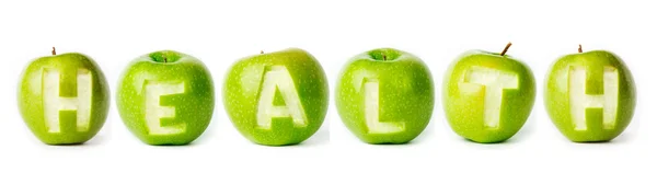 Woord "gezondheid" gemaakt van groene appels. — Stockfoto