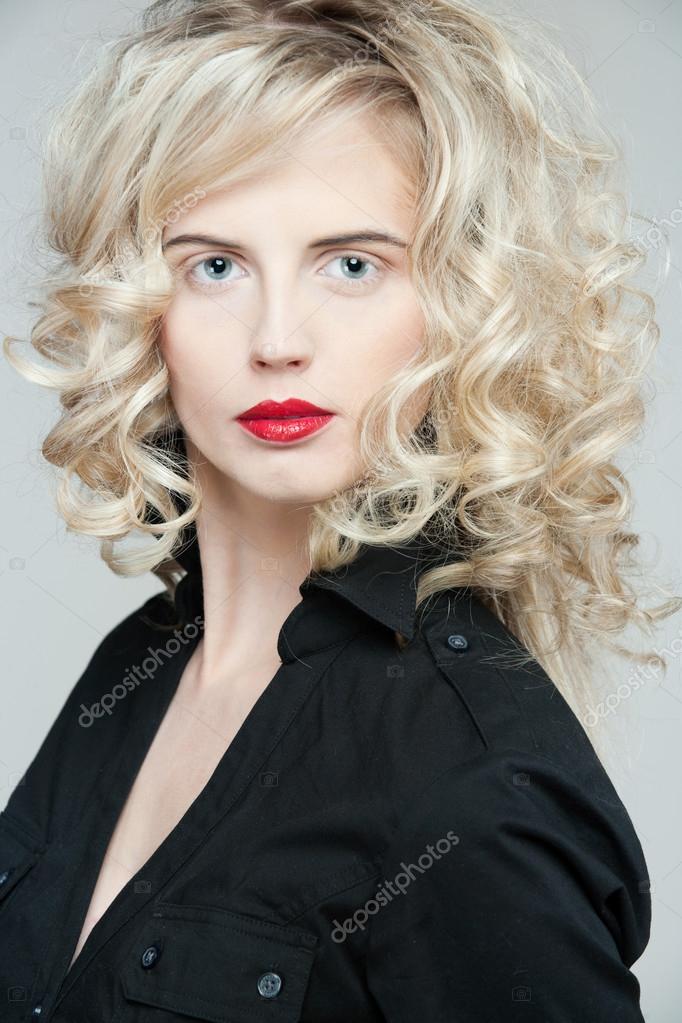 Long hair blonde curly secretary