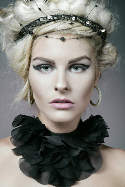 Beautiful fashion model with blond hair.