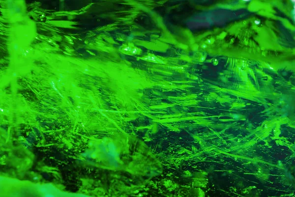 Abstract green crystal texture as the background. Full screen