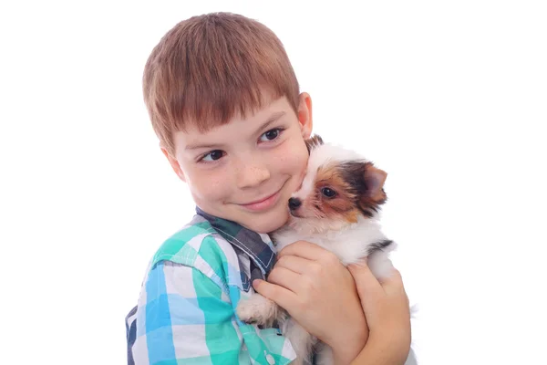 Мальчик и щенок — стоковое фото