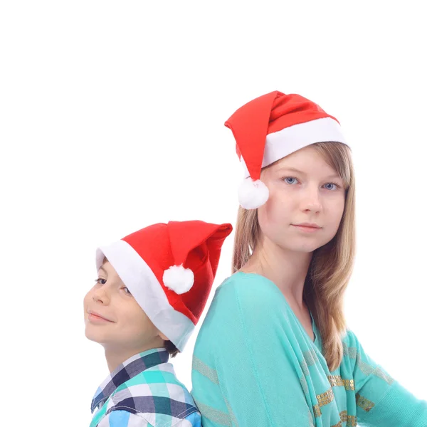 Kids in Santa caps — Stock Photo, Image