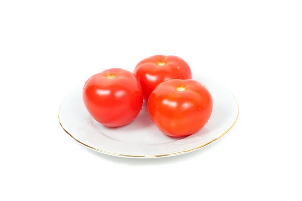 Tomates vermelhos no prato — Fotografia de Stock