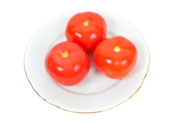 Tomates rouges sur l'assiette — Photo