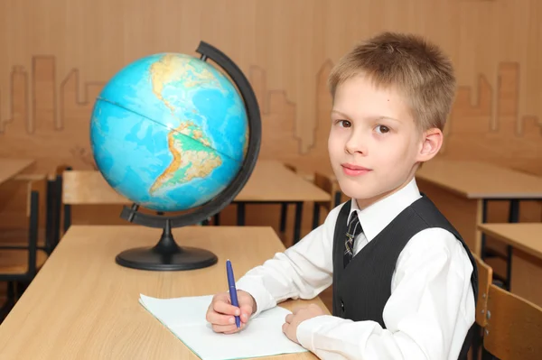 Little boy in a classroom — Stock Photo, Image