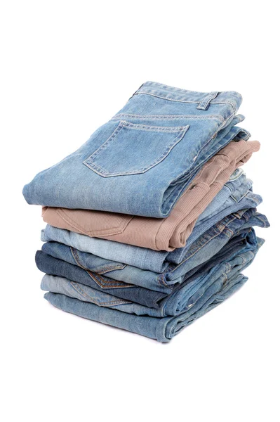 Flera jeans isolerade — Stockfoto