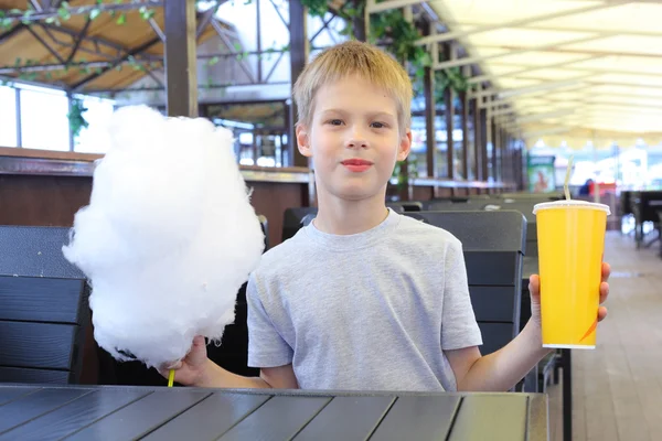 Little boy with cotton candy — Stock Photo, Image