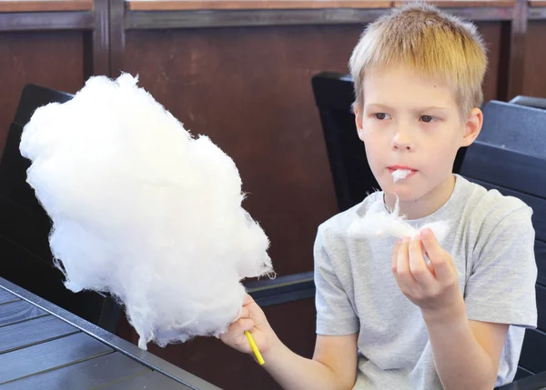 Little boy with cotton candy — Stock Photo, Image