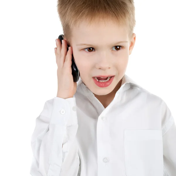 Jongen met een mobiele telefoon — Stockfoto