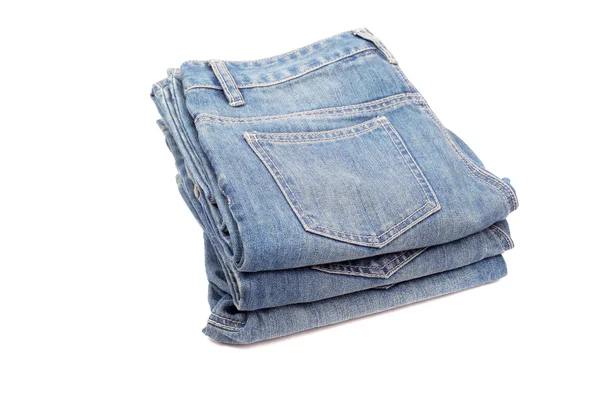 Flera jeans isolerade — Stockfoto