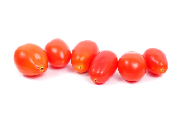 Tomates sobre fundo branco — Fotografia de Stock