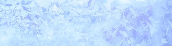 Ornamento di ghiaccio sul vetro — Foto Stock