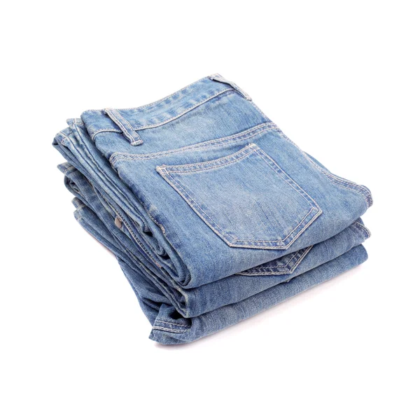 Several jeans on white — Stock Photo, Image