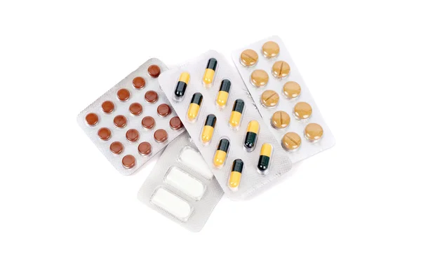 Blistry tabletek na biały — Zdjęcie stockowe