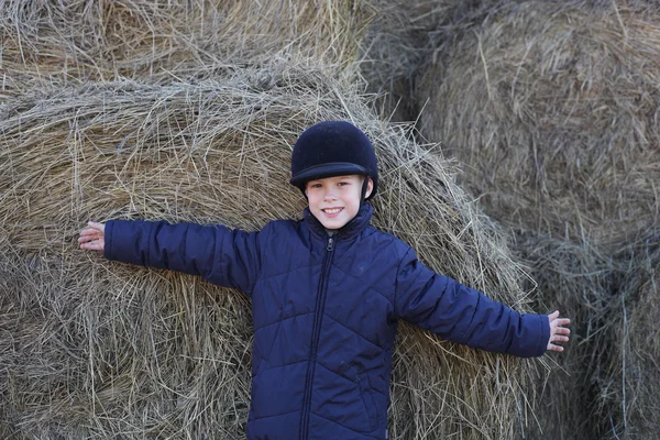 Boy on the horse farm — Stock Photo, Image