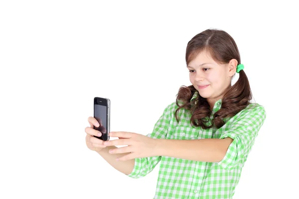 Chica disparando por su teléfono móvil — Foto de Stock