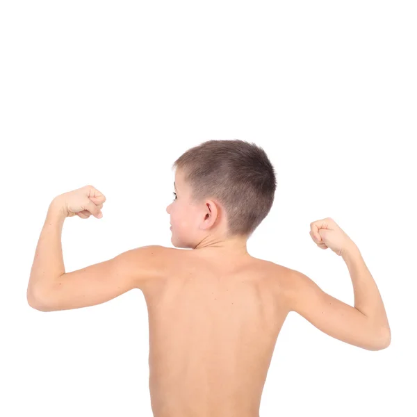 Ragazzo dimostrando i suoi muscoli — Foto Stock