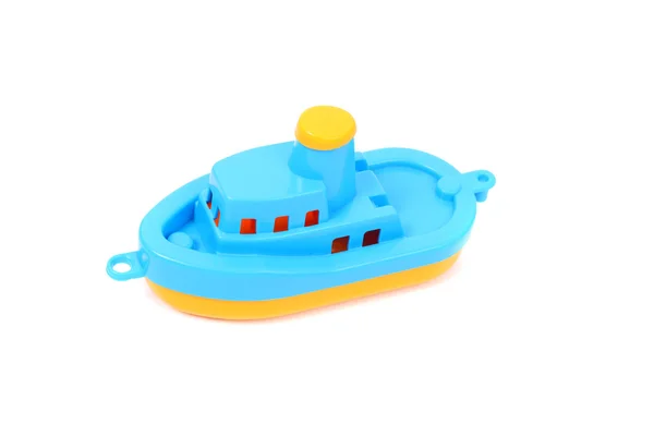 Azul y amarillo juguete barco — Foto de Stock