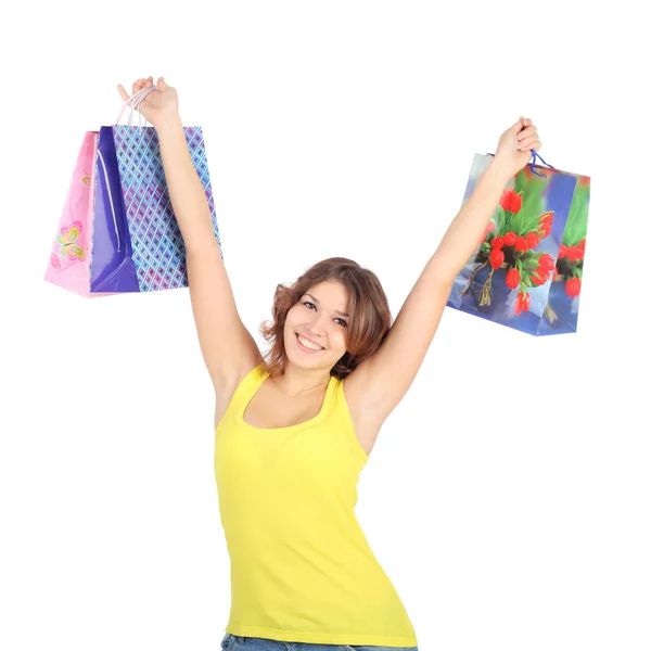 Chica joven con bolsas de regalo — Foto de Stock