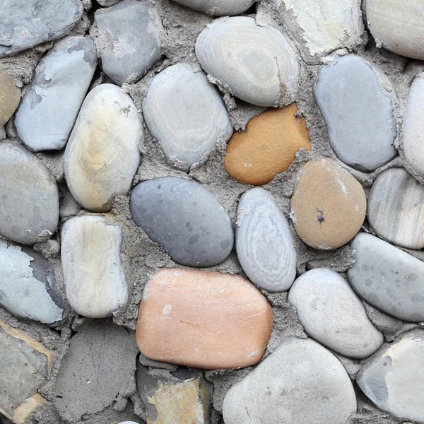Wall with different stones — Stock Photo, Image