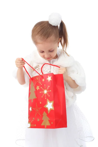 Girl with holiday gift bag — Stock Photo, Image