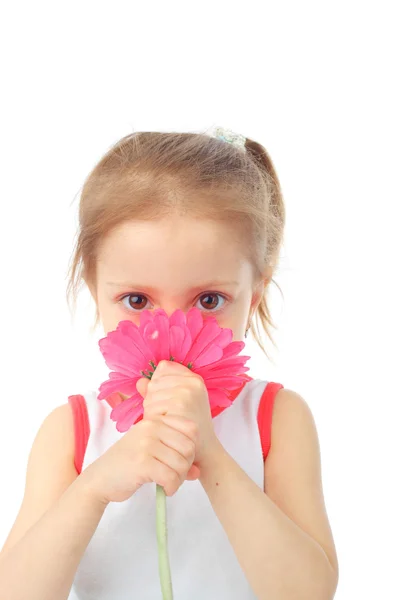 Chica oliendo la flor — Foto de Stock