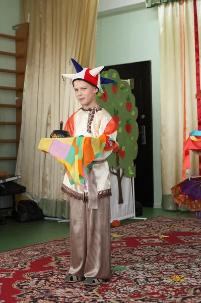 Boy in costume of skomorokh — Stock Photo, Image