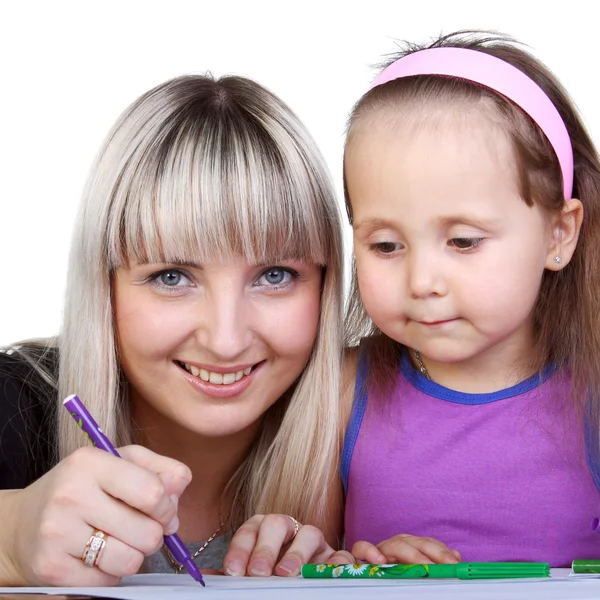 Mother teaching her daughter drawing — Stock Photo, Image