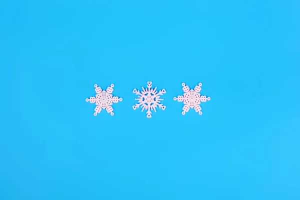 White snowflakes over blue — Stock Photo, Image