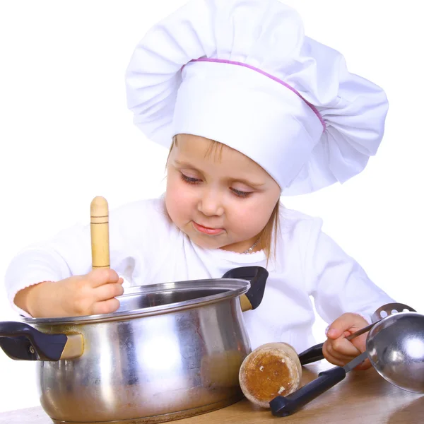Söt liten baby i cook mössa — Stockfoto