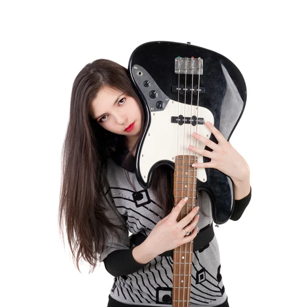 Brunette meisje bedrijf elektrische gitaar — Stockfoto