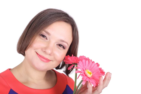 Mooie vrouw met roze bloemen — Stockfoto