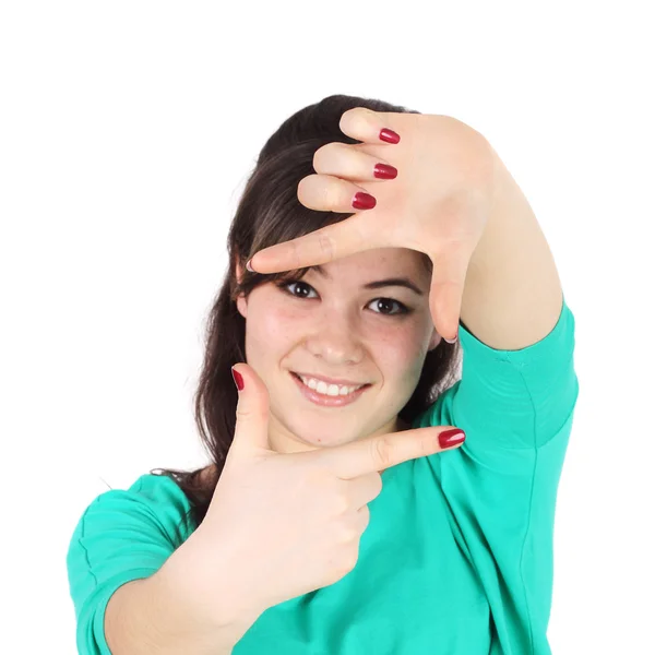 Hübsches Mädchen rahmt mit Fingern — Stockfoto