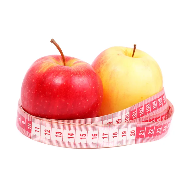 Manzanas con cinta métrica —  Fotos de Stock